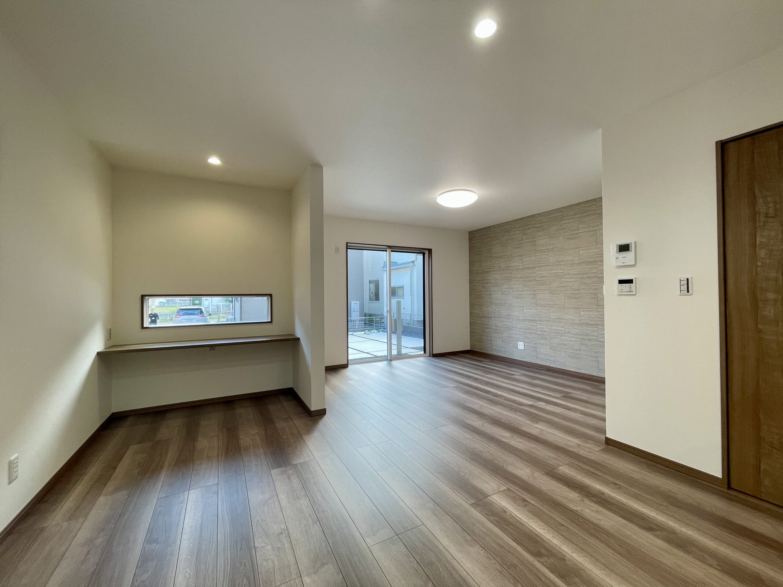 家族の思い出を包み込み、日々を凛と整える家。